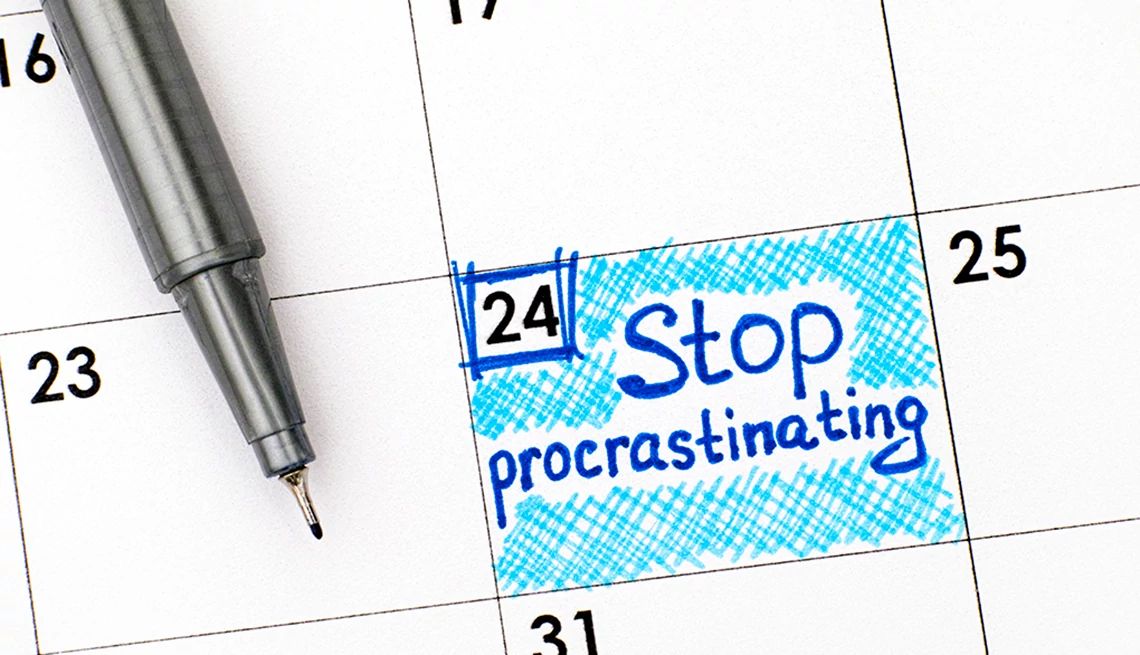 Everyone procrastinates sometimes A close-up view of a calendar with "Stop procrastinating" written on it