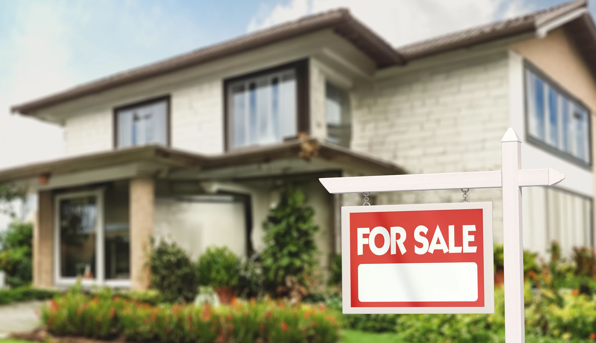 Guide to Buying a Vacation Home a for sale sign