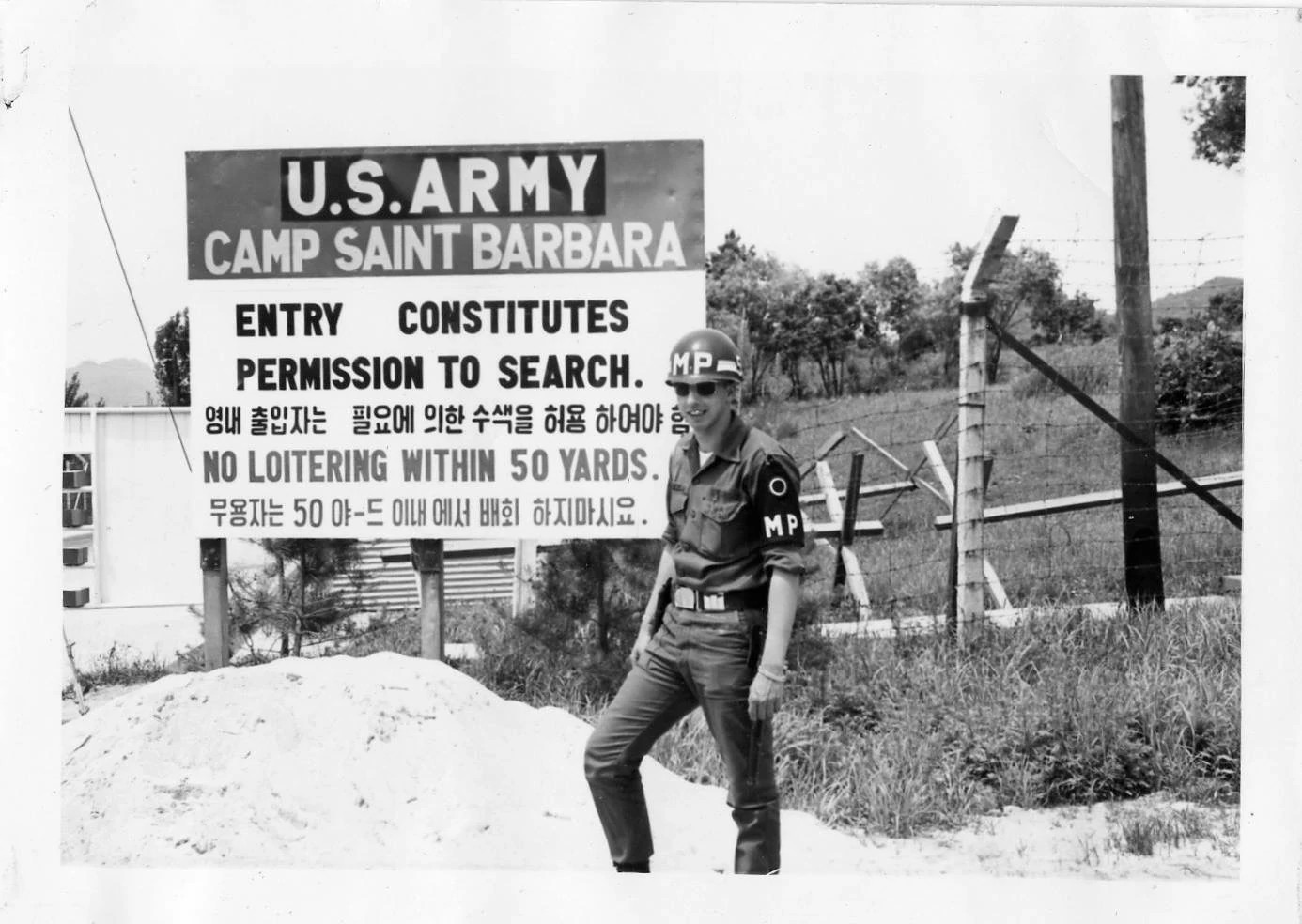 Ken Kroiss in his army uniform and MP helmet while serving in the DMZ in the 1960s.