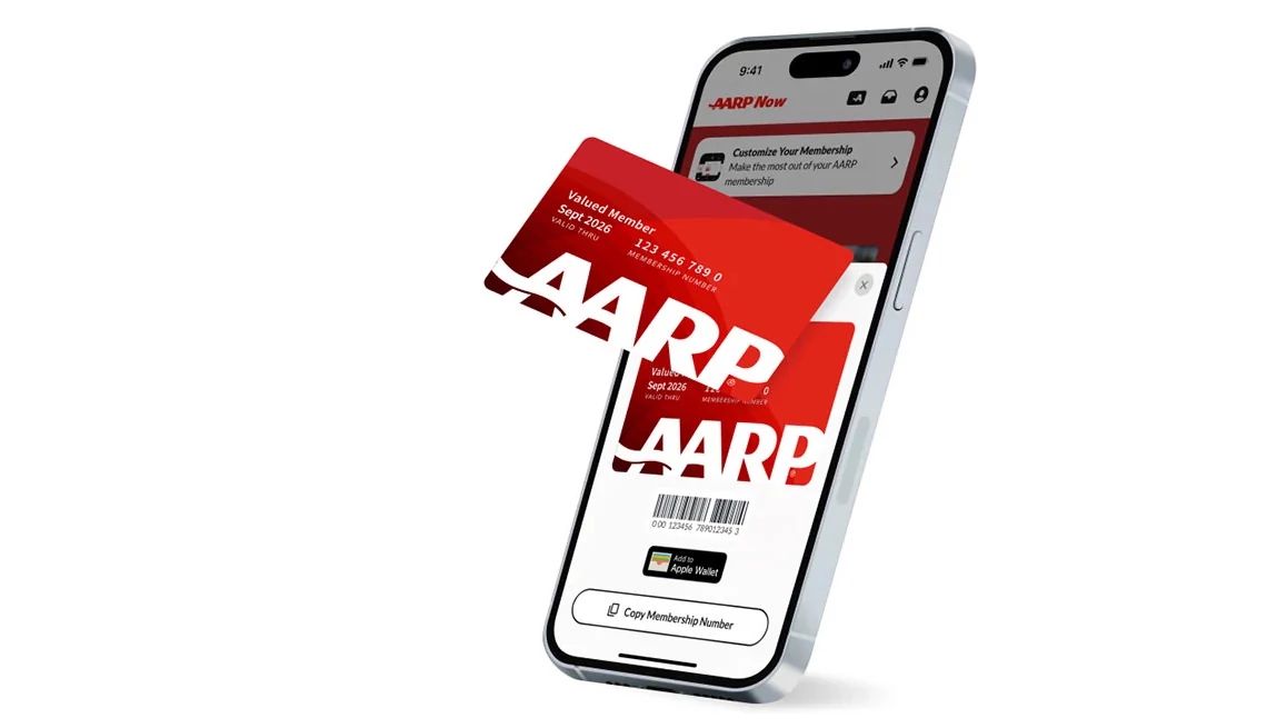 AARP Now App cell phone with A A R P now app on screen and red membership card laying on the phone