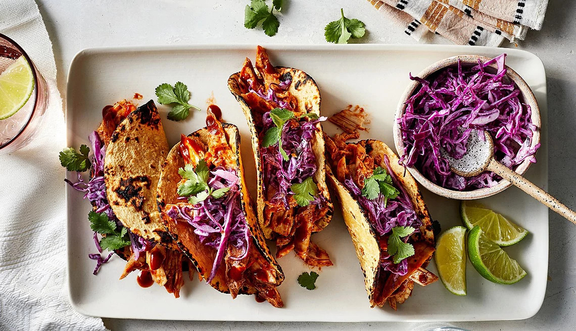 https://aarp.widen.net/content/5o1ovgvzes/jpeg/1140-bbq-chicken-tacos.jpg?crop=true&anchor=0,0&q=80&color=ffffffff&u=xp0vsk&w=1140&h=655