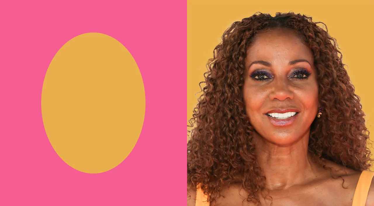 Holly Robinson Peete with shoulder-length curly hair featured in an oval face shape hairstyle guide