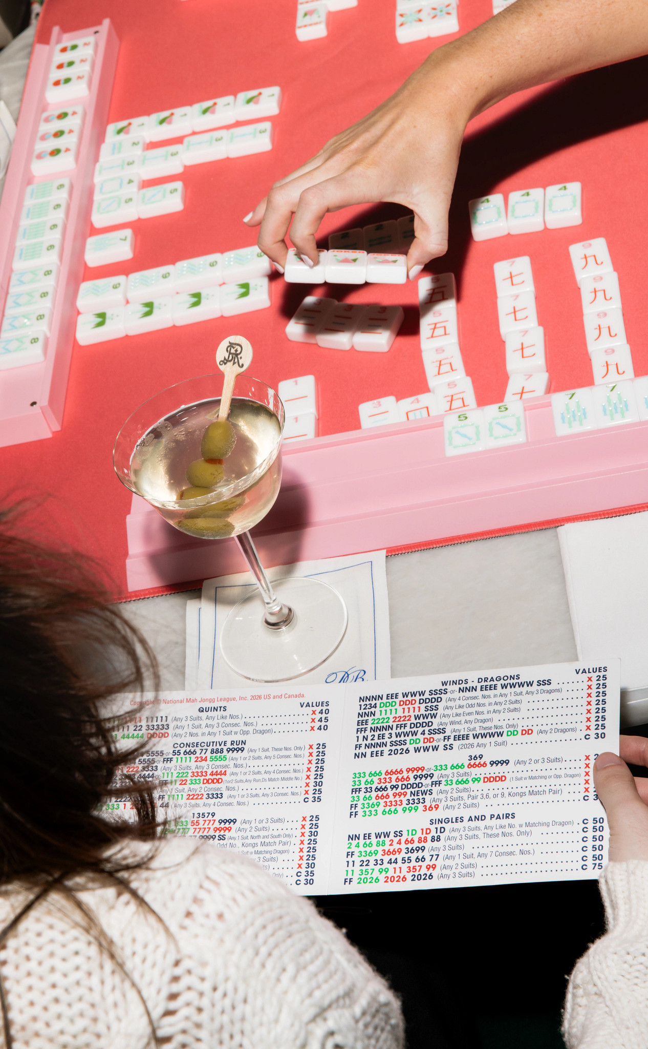 an overhead shot of a mah-jongg board on a table