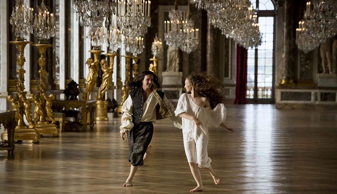 George Blagden and Alexia Giordano in the TV series Versailles George Blagden and Alexia Giordano running around barefoot in an empty room in the TV series Versailles