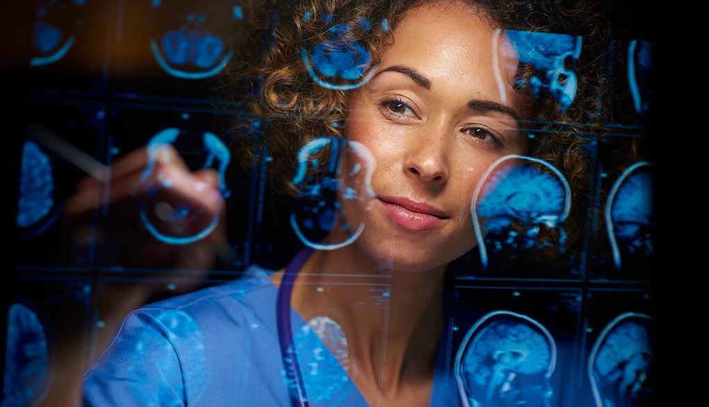 Gender does account for some differences in brain function A female doctor looking at MRI scans of human brains