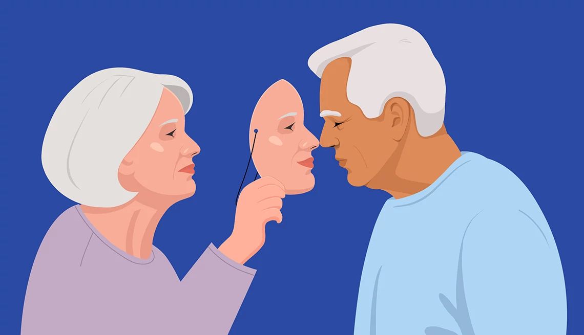 Achieve Movie-Level Sex a woman and man face each other. the woman holds up a mask of her own face