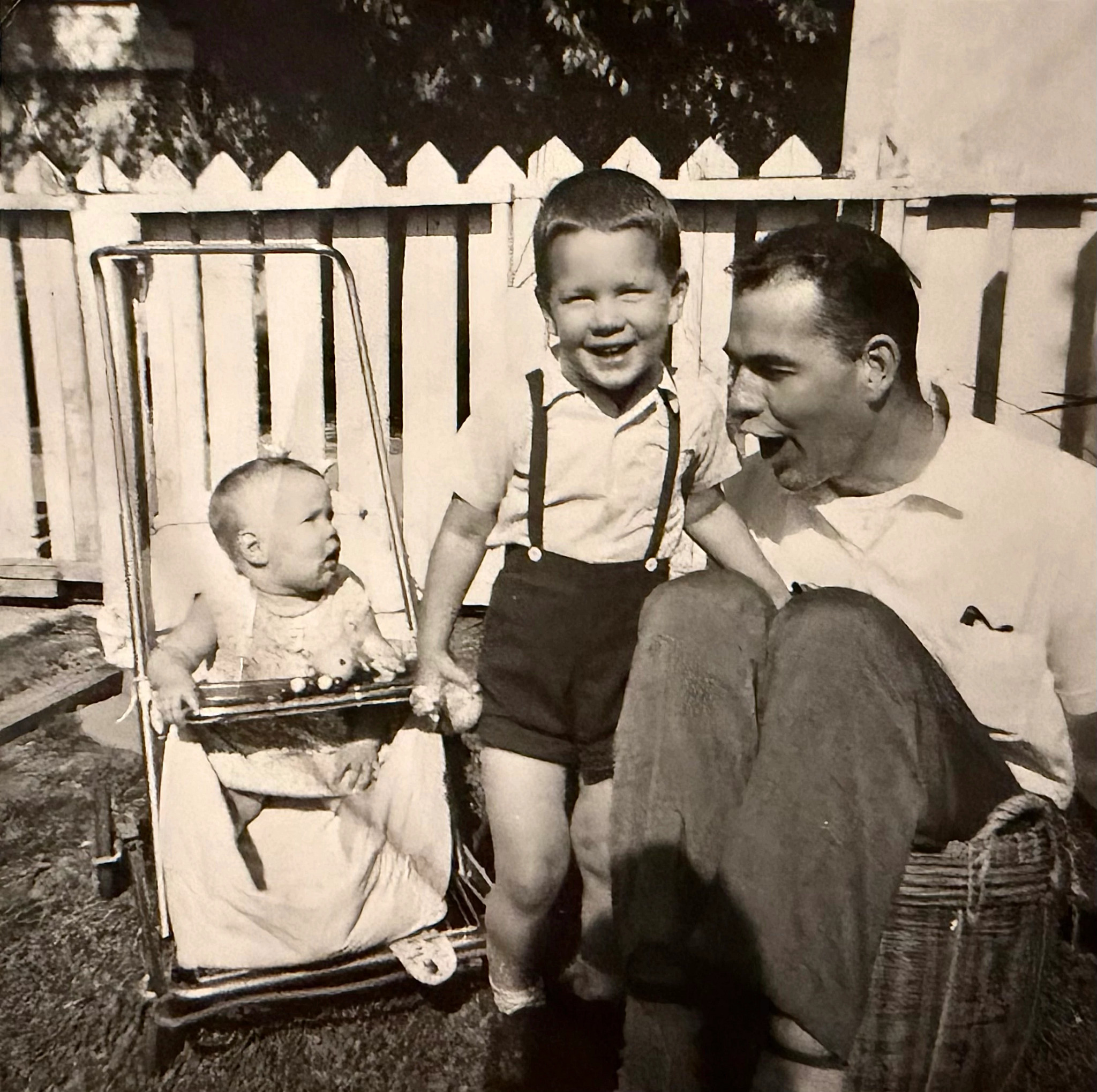 a black and white photo shows author Bart King, his brother, Kris, and their father in 1962