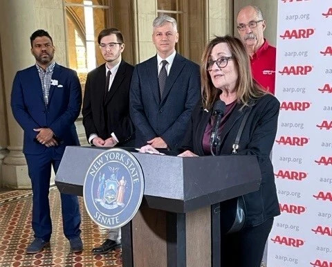 a group photo of a presentation at NY State Senate