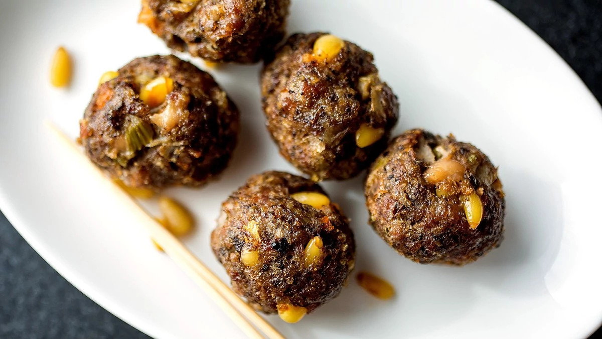 A close-up view of Greek lamb meatballs on a plate