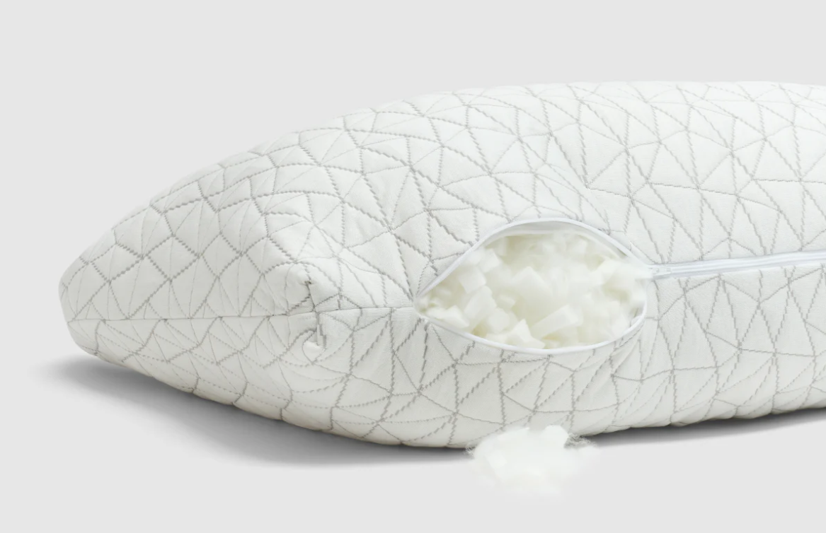 The Coop Original Adjustable Pillow unzipped with some fill coming out