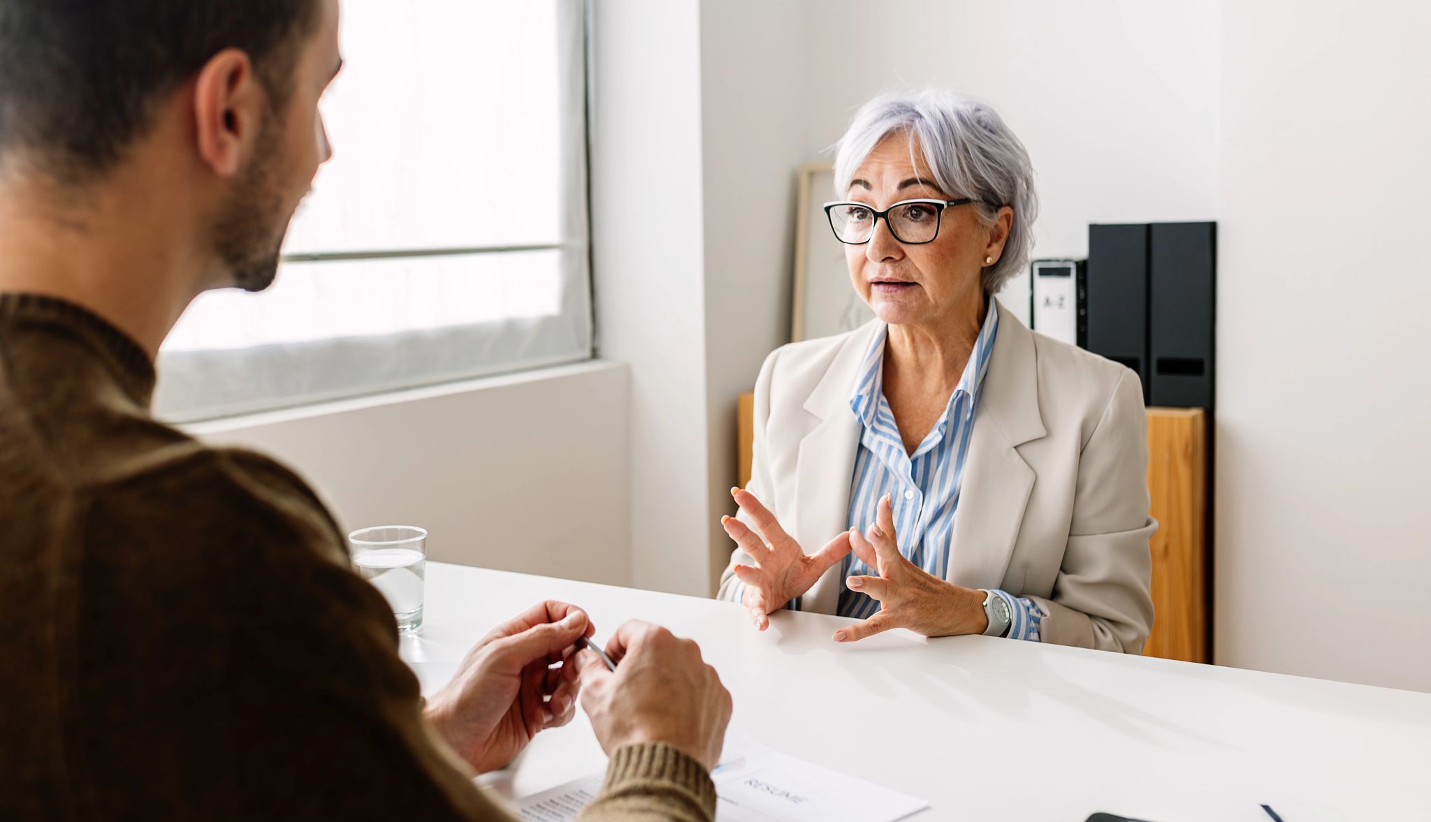 Smart Guide to Getting Hired a person in a job interview