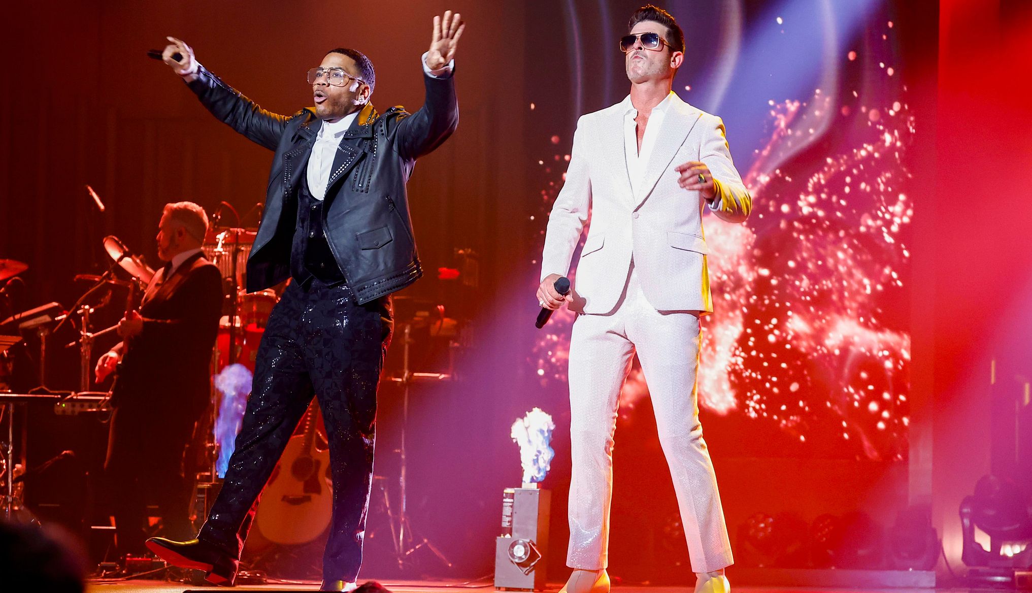Nelly and Robin Thicke at the 25th Annual Mark Twain Prize For American Humor honoring Kevin Hart Nelly and Robin Thicke perform onstage during the 25th Annual Mark Twain Prize For American Humor