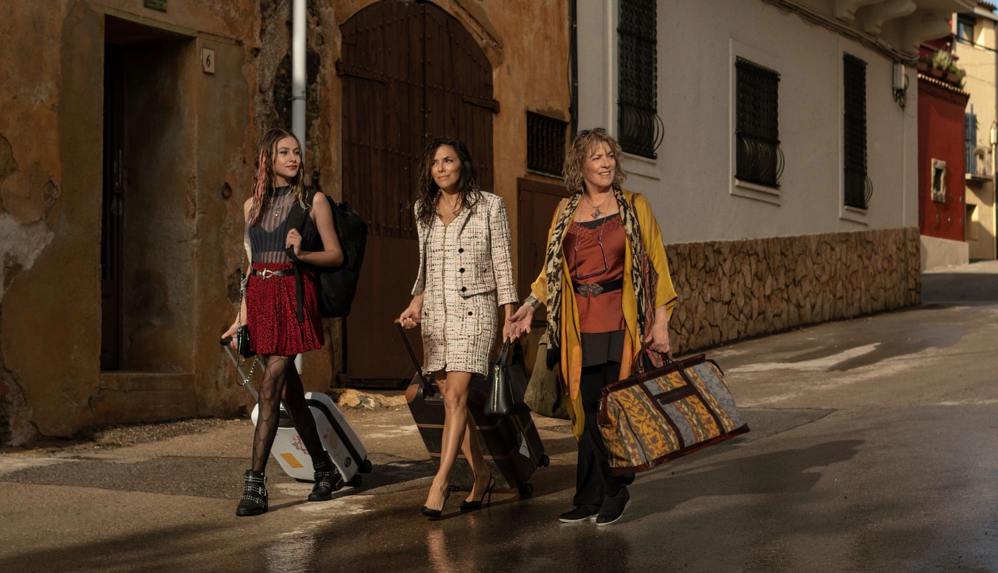 Eva Longoria stars in 'Land of Women' Eva Longoria walking down street with two other women in a still from Land of Women