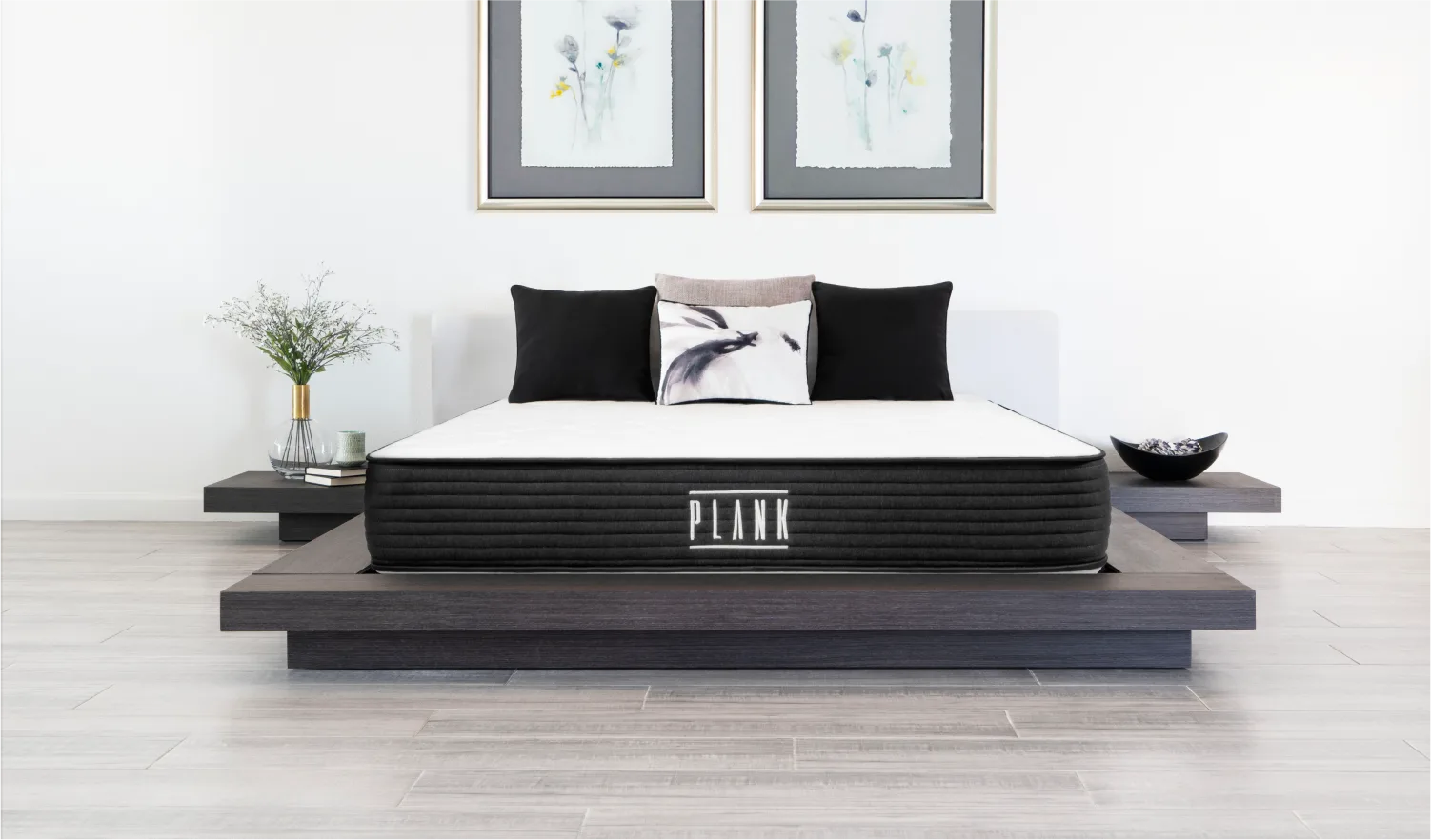 The Plank Firm mattress on a platform bedframe.