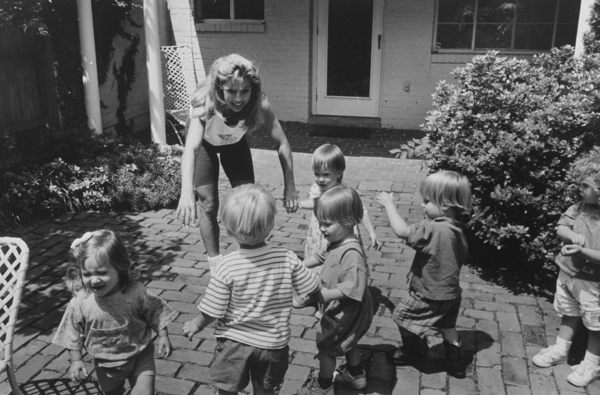 denise austin interacting with small children at a play group