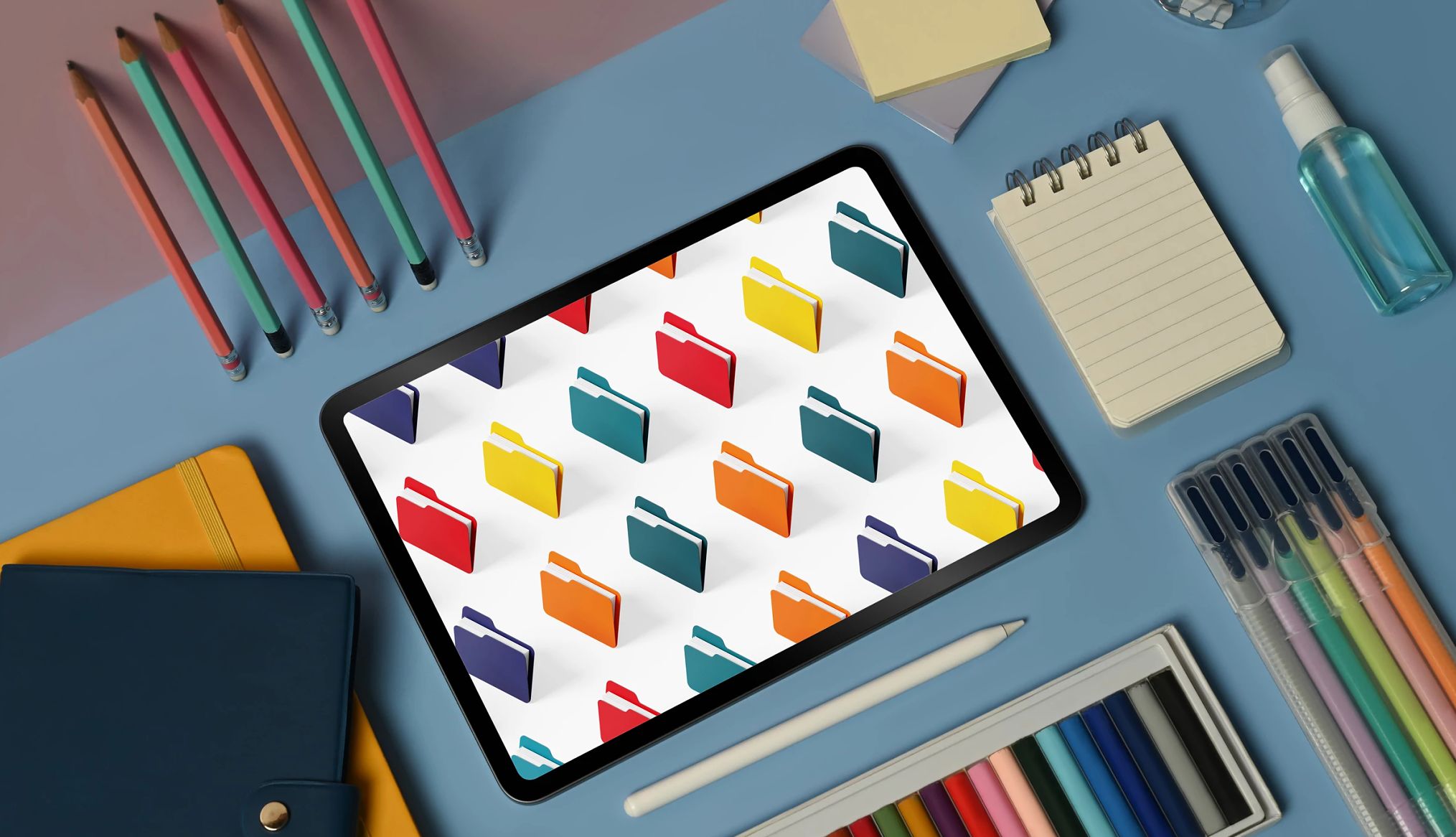 Apps to Help Caregivers Get Organized, Find Support a desk with a tablet and other office supplies on it