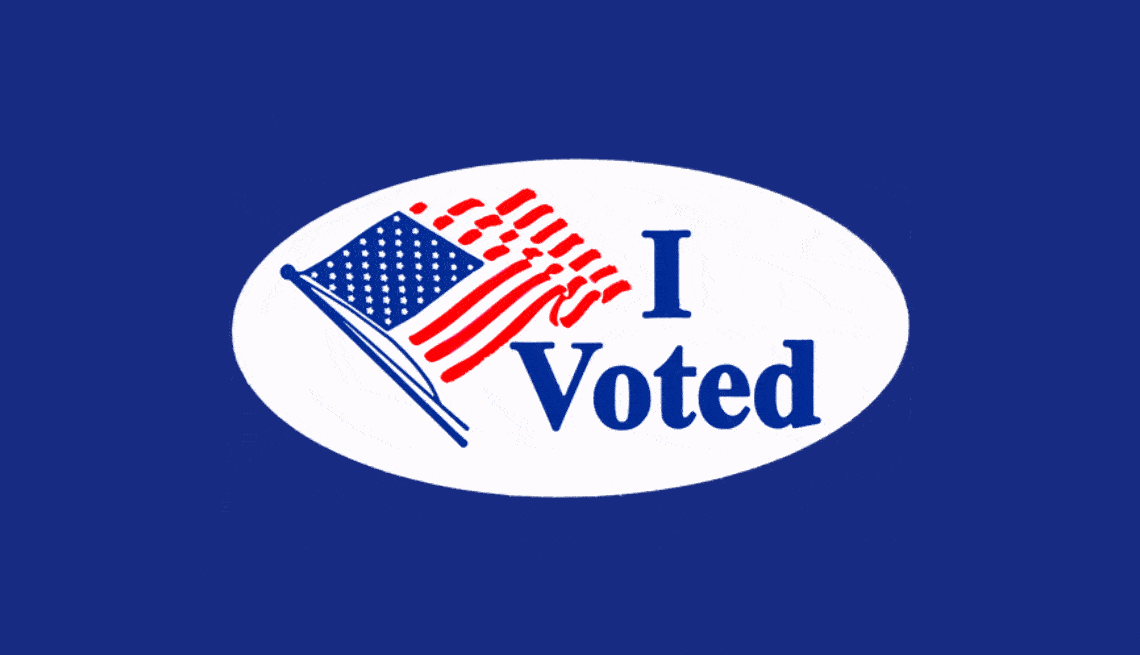 I voted sticker an american flag and the words i voted coming together to form an oval sticker
