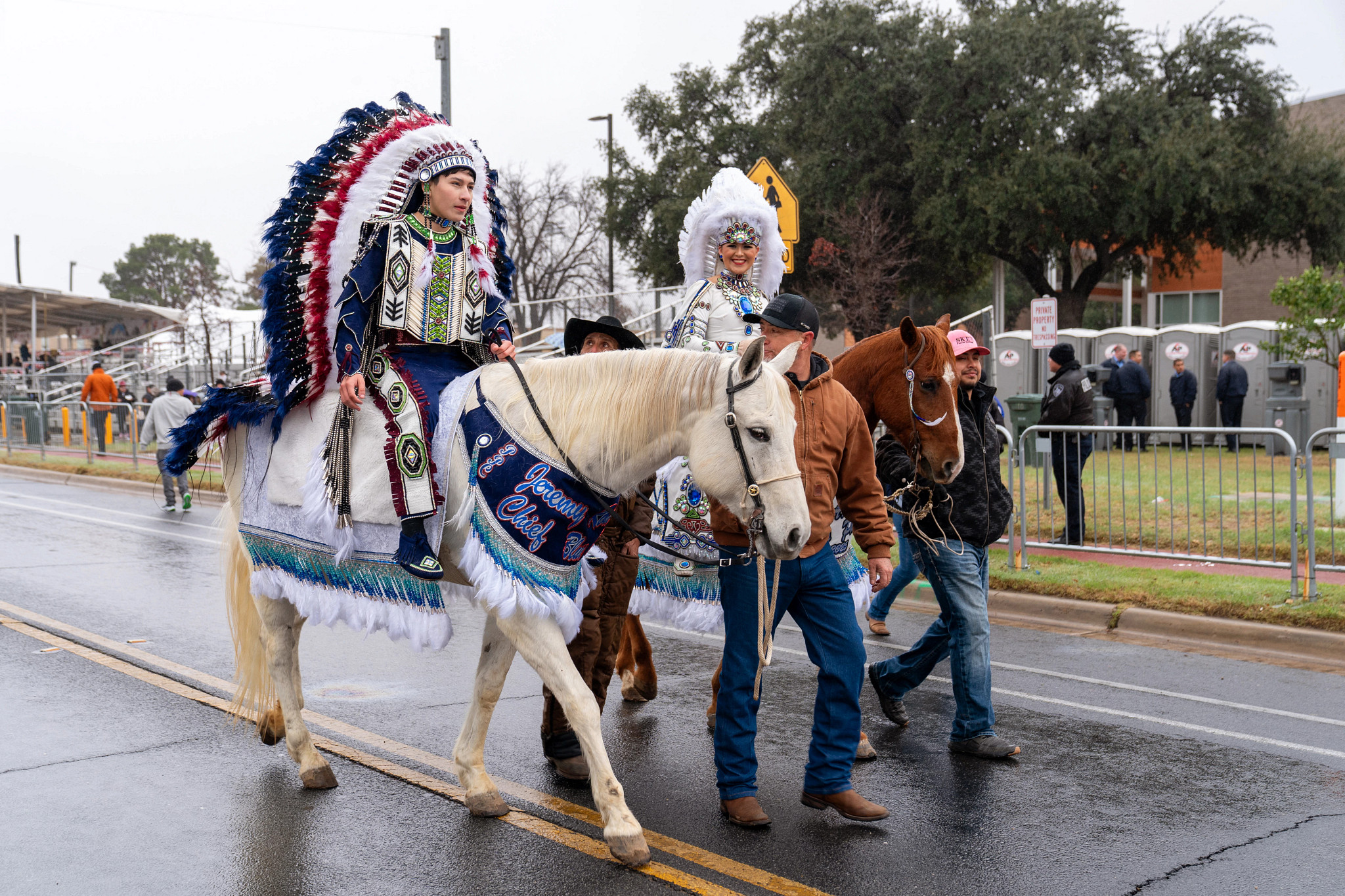people riding horseback during a parade