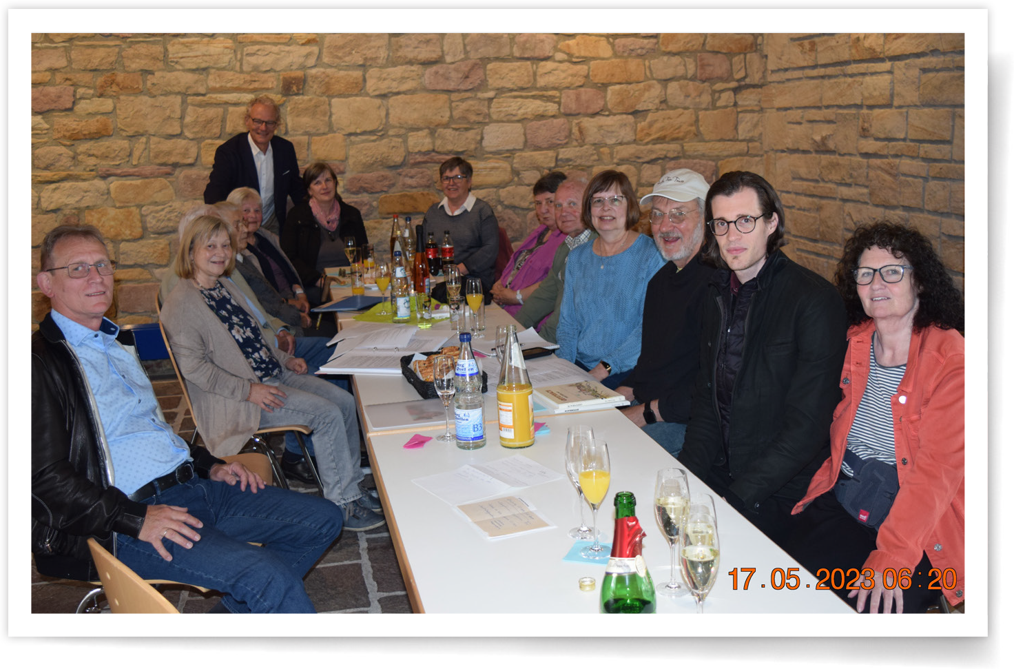 Debra Wolfe traveled from Indiana to Germany Debra Wolfe sitting at a table with her relatives