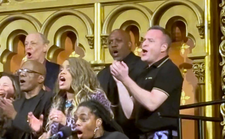 a photo shows Adam Turner singing with the Marble Collegiate Gospel Choir in New York City in May 2025