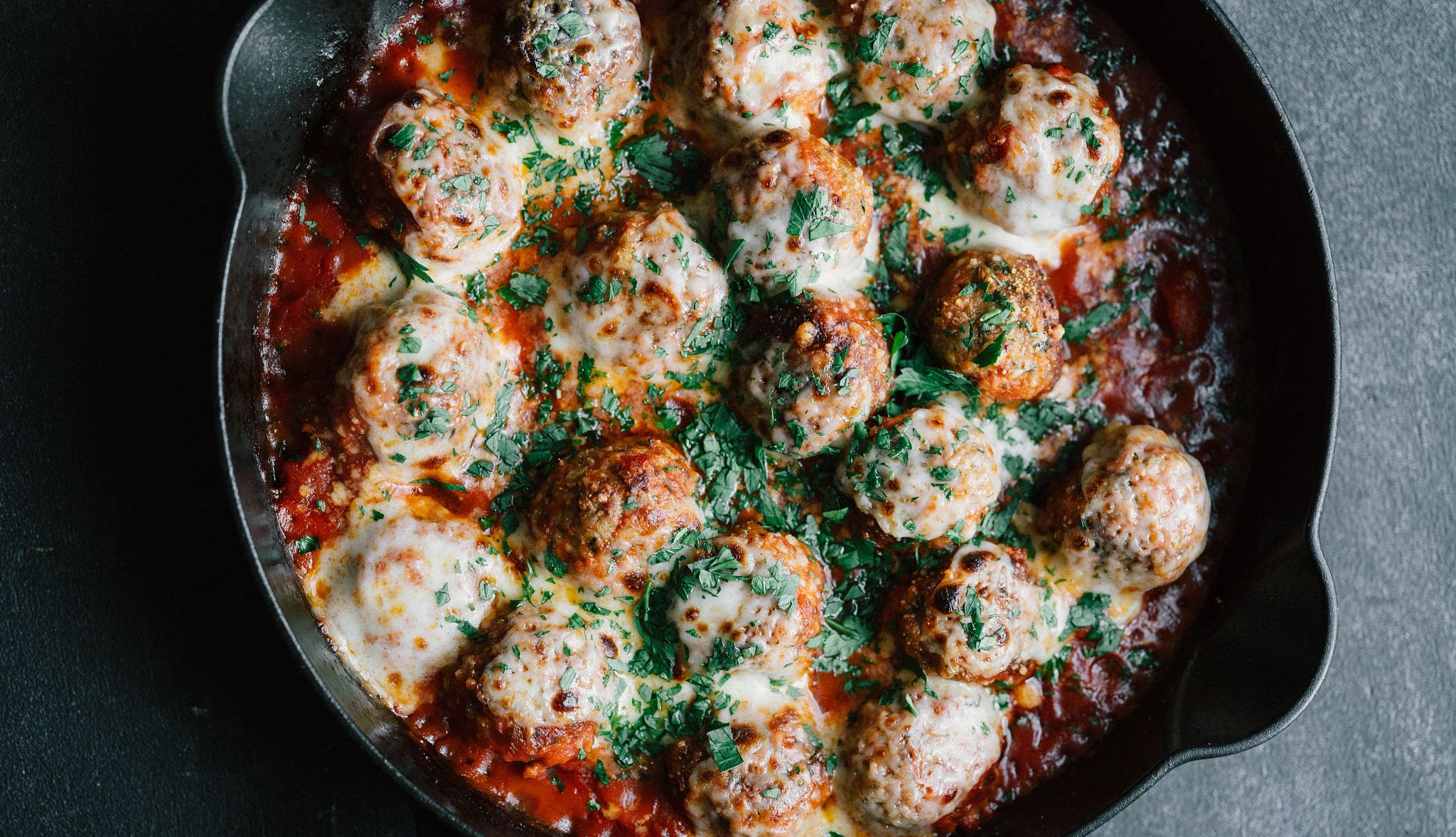 Chicken Parmesan Meatballs Chicken Parmesan Meatballs in a skillet