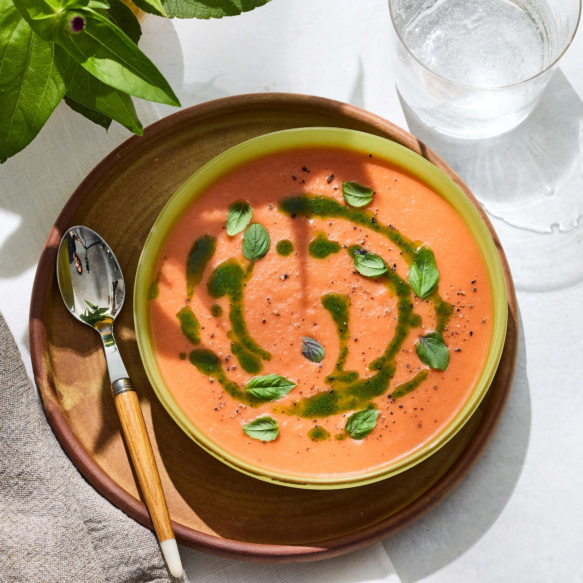 Farmers Market Menu spicy stone fruit gazpacho with basil oil is pictured
