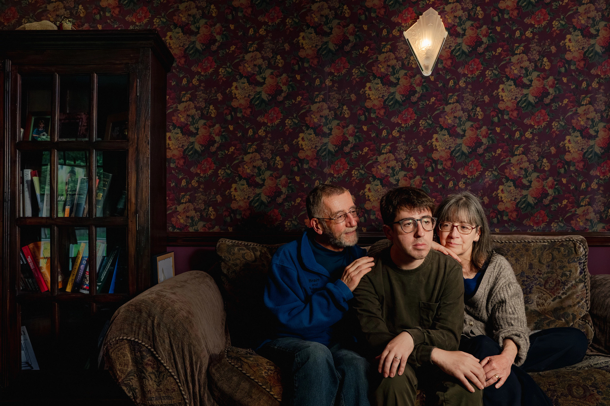people sitting together on a couch