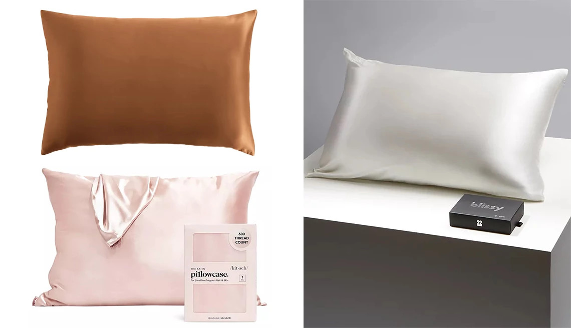three satin pillowcases in different colors