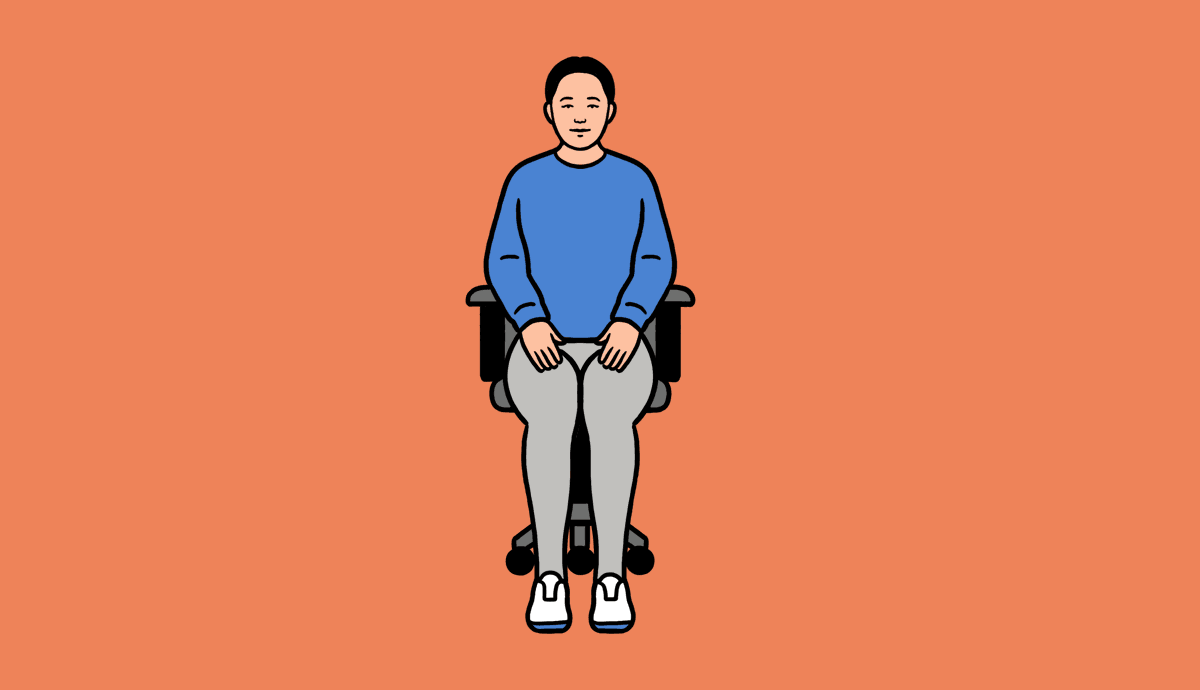A woman sits in a desk chair, twisting to one side and the other.