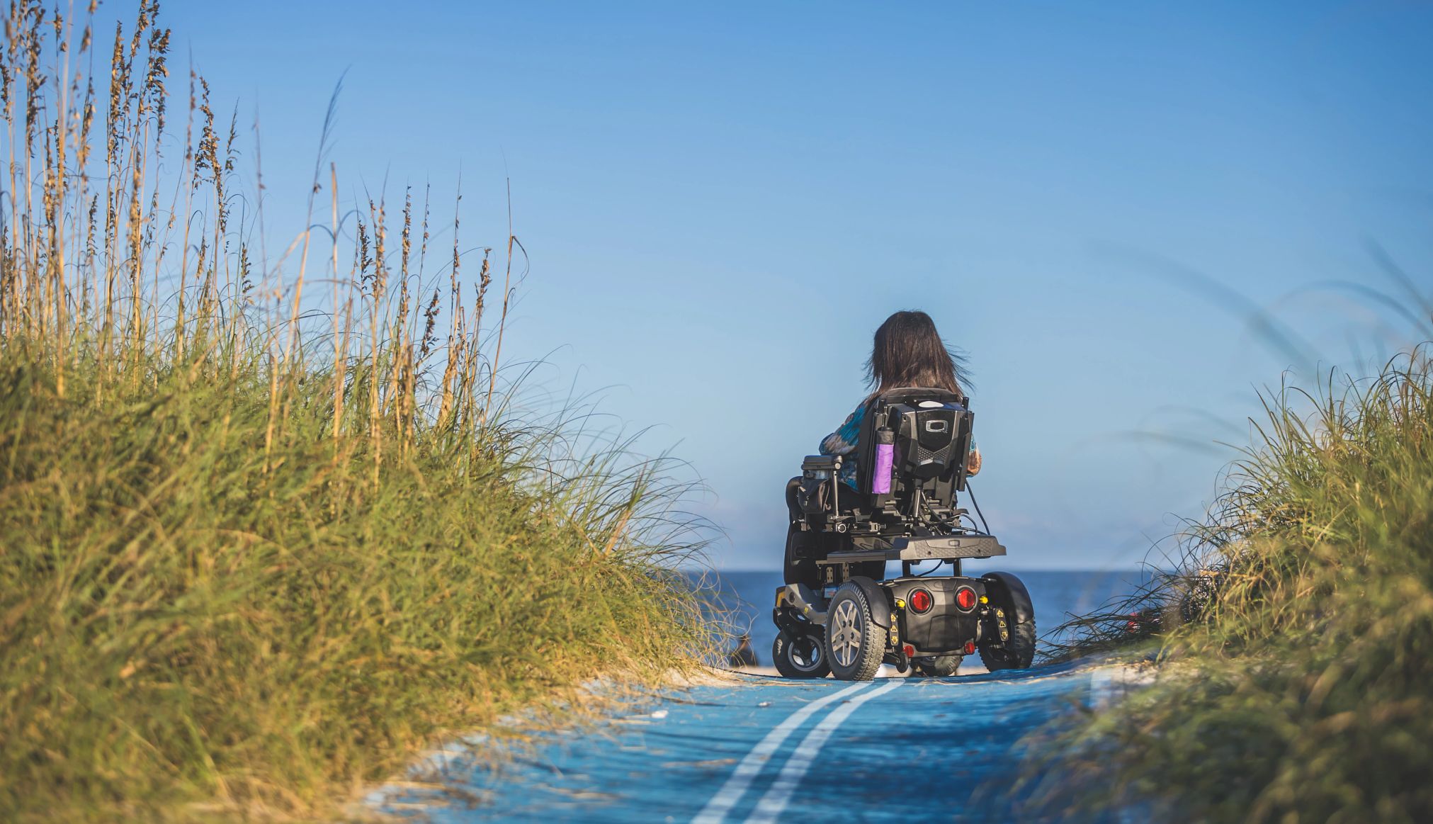 Accessible Vacation Destinations A woman enjoys the view.