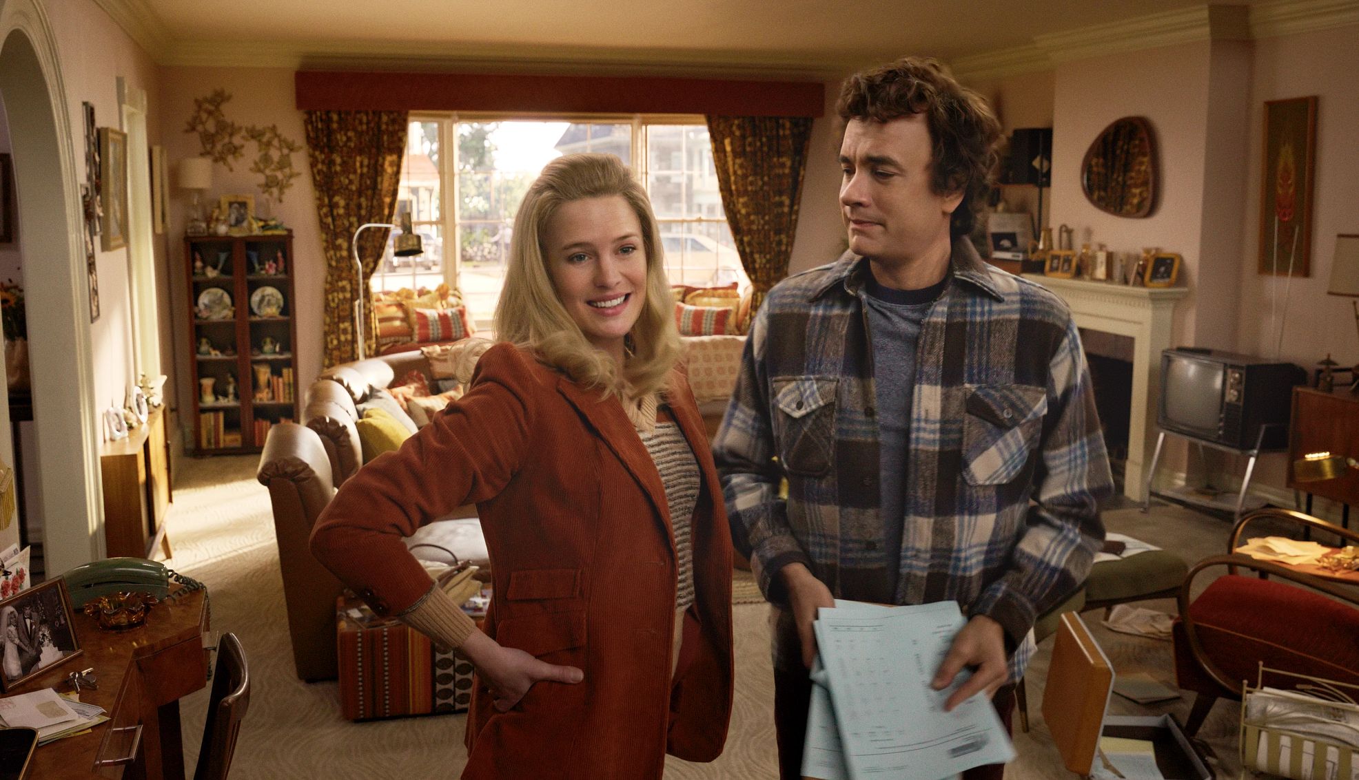 Tom Hanks and Robin Wright star Tom Hanks and Robin Wright standing in a living room