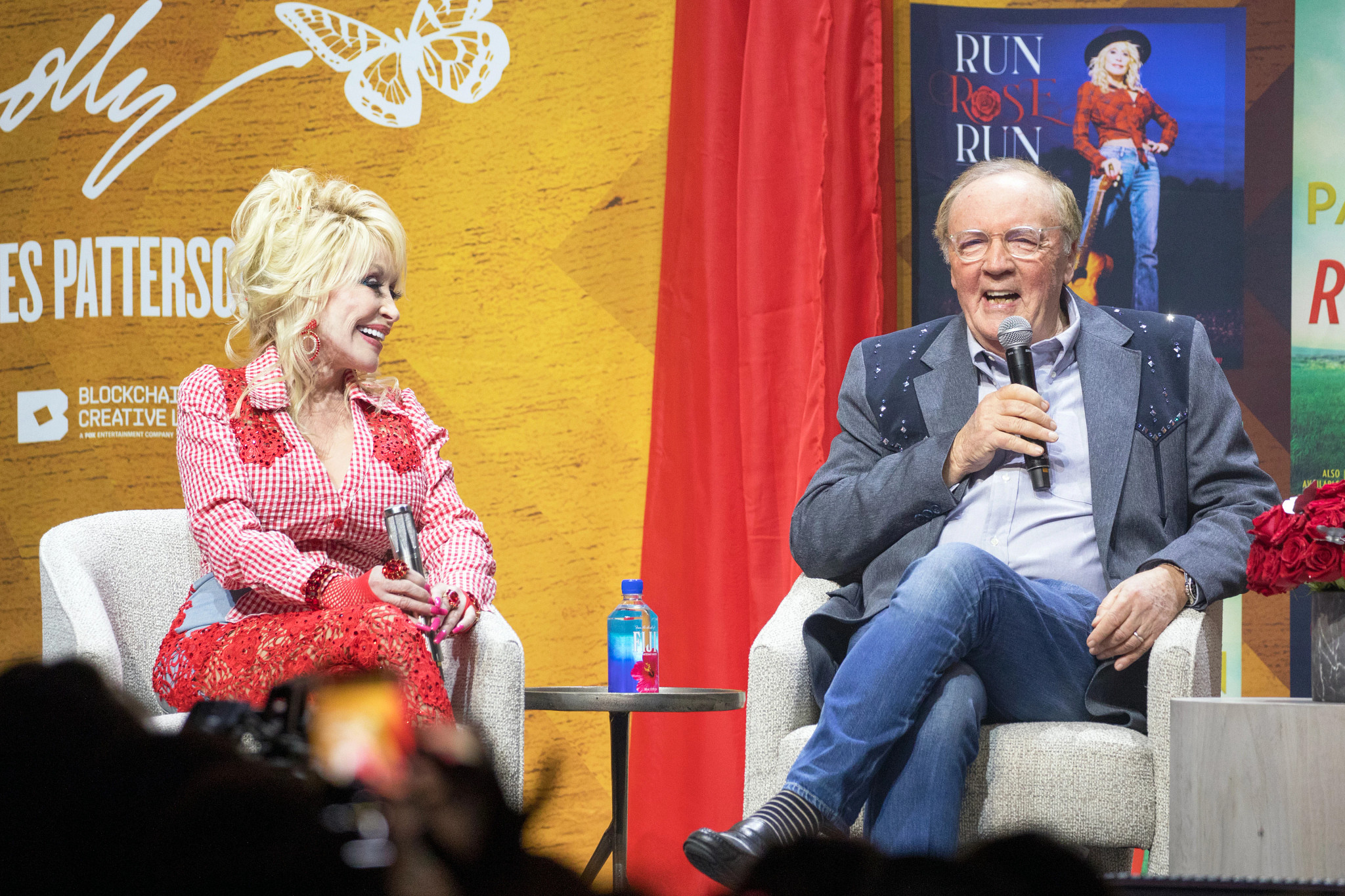 dolly parton and james patterson engaging in a lively discussion about their collaborative book