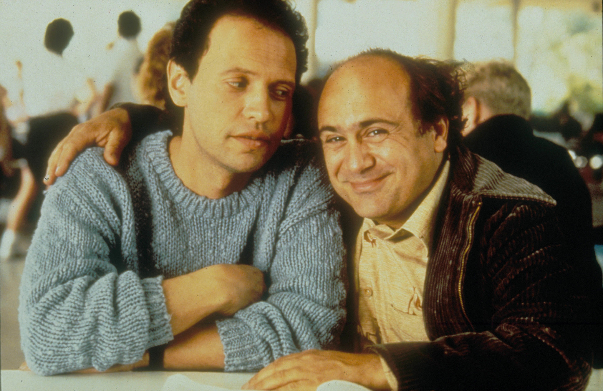 danny devito and billy crystal posing together during the production of throw momma from the train