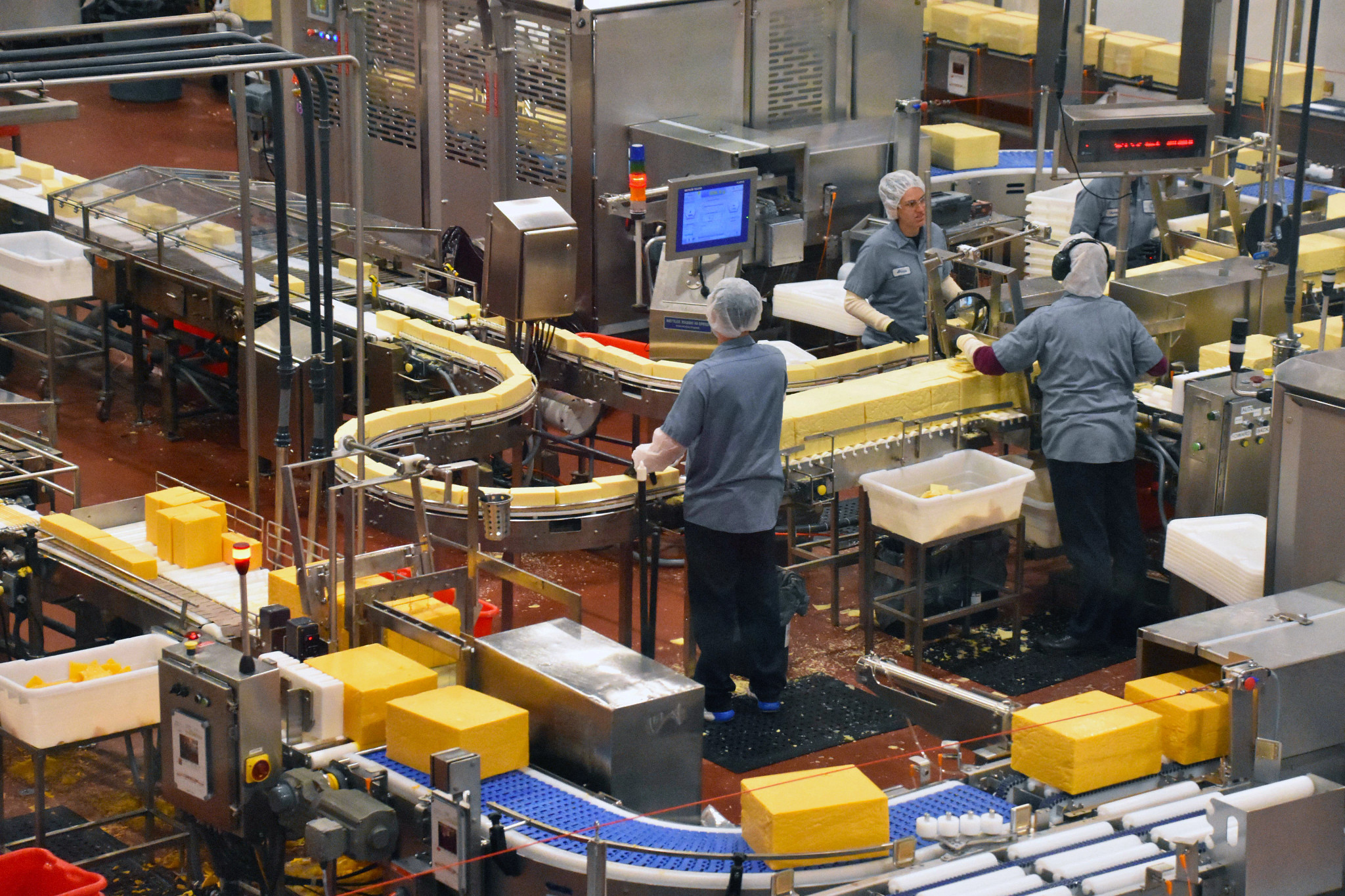 workers on an assembly line in a factory