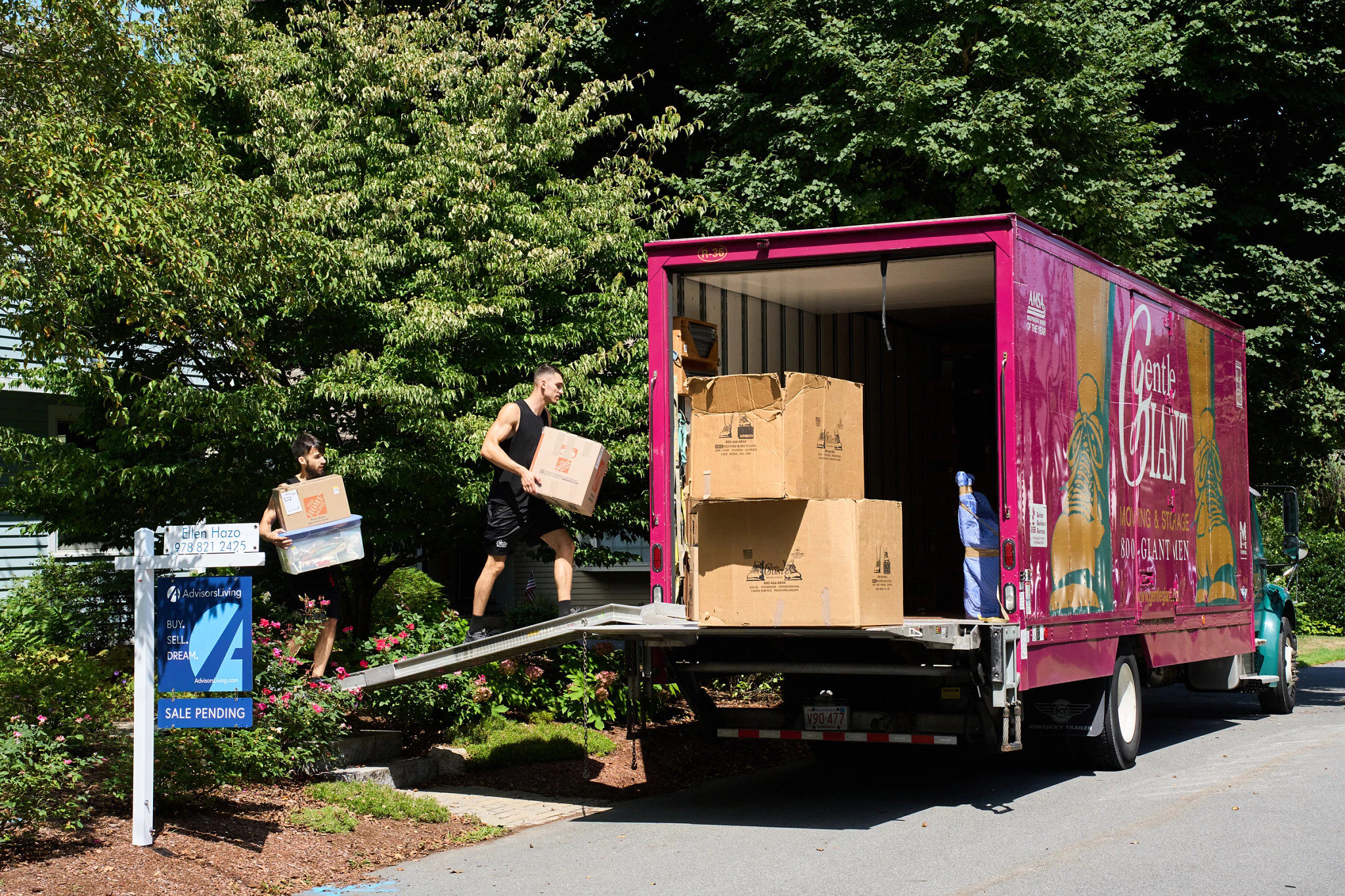 a moving truck is being filled with boxes
