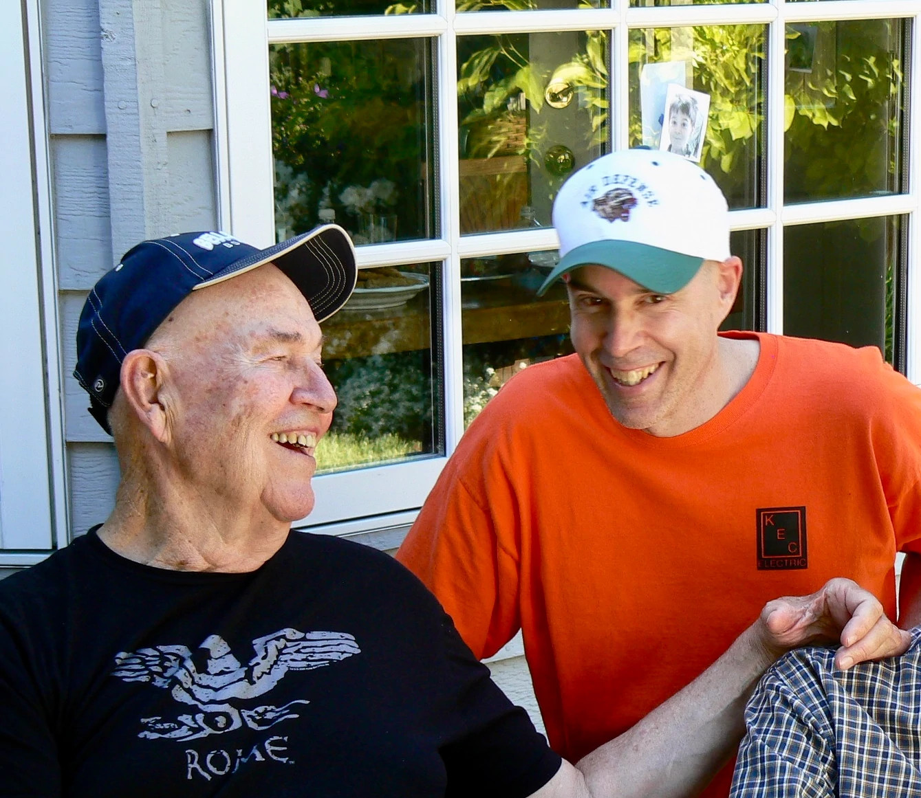 a photo shows author Bart  King sharing laughs with his dad, Michael, in 2010 