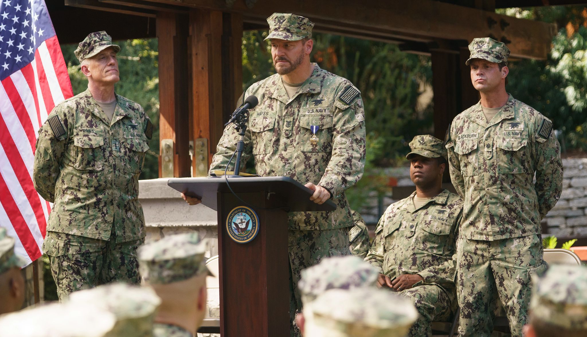 David Boreanaz plays Jason Hayes on 'SEAL Team' David Boreanaz as Jason Hayes in military uniform, standing at podium in a still from SEAL Team