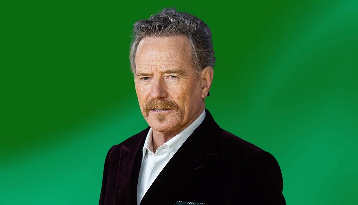 Bryan Cranston honors WWII veteran Bryan Cranston against green ombre background