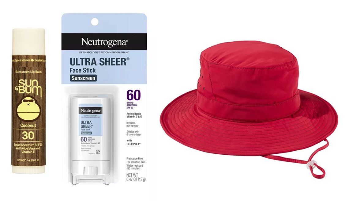 Solving the Worst Summer Beauty Problems sunscreens for face and body, and a red sun hat
