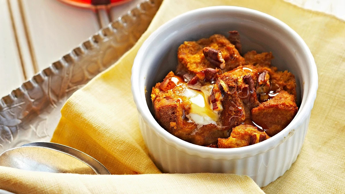 A close-up view of pumpkin breakfast bread pudding in a bowl