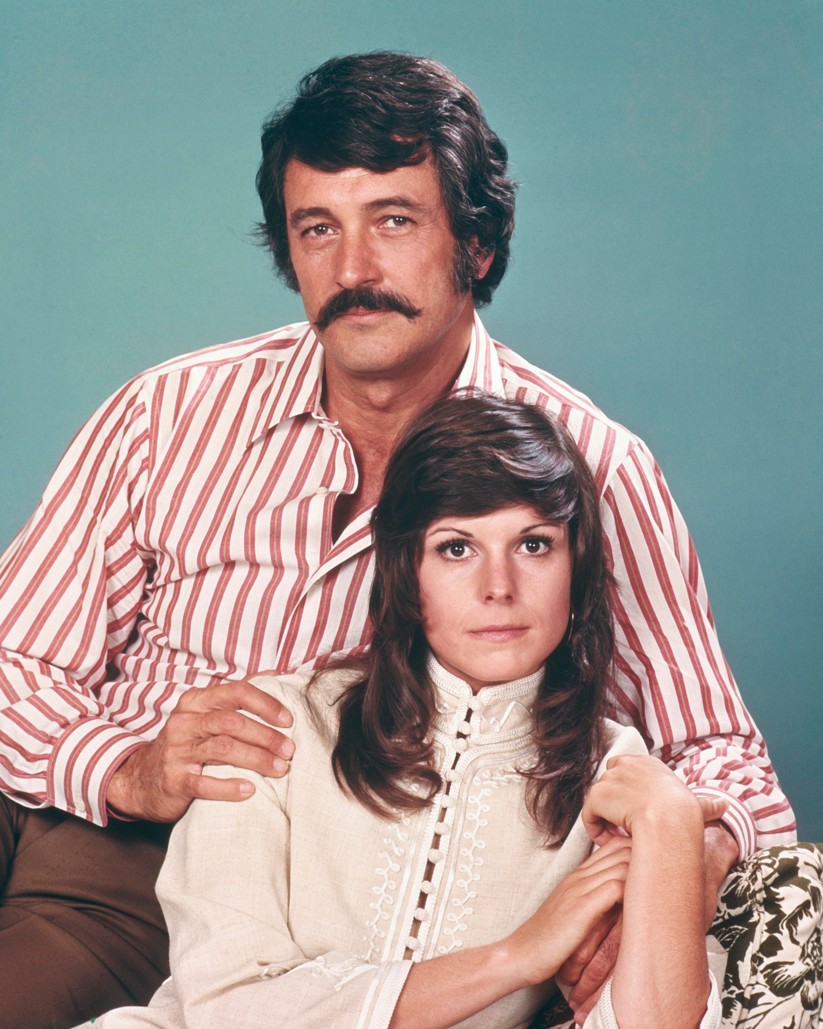 rock hudson and susan saint james sit close to each other