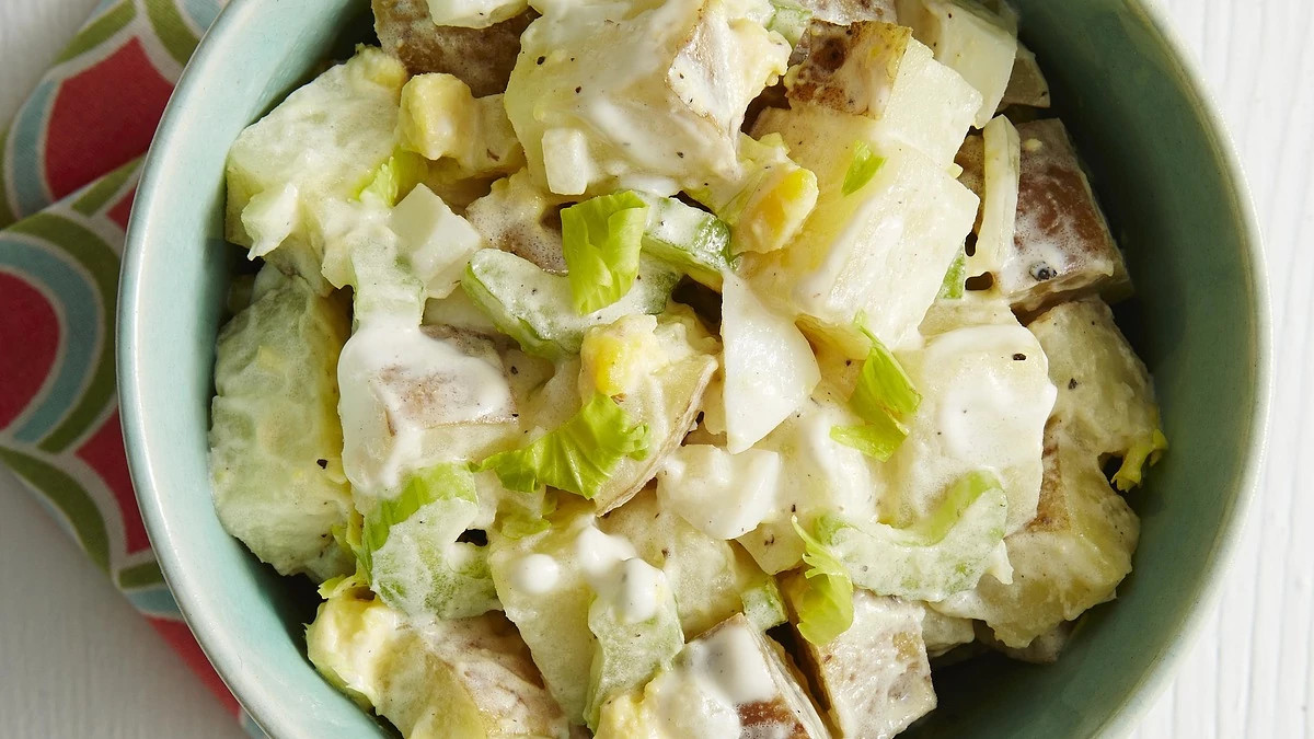 A close-up view of classic potato salad in a bowl