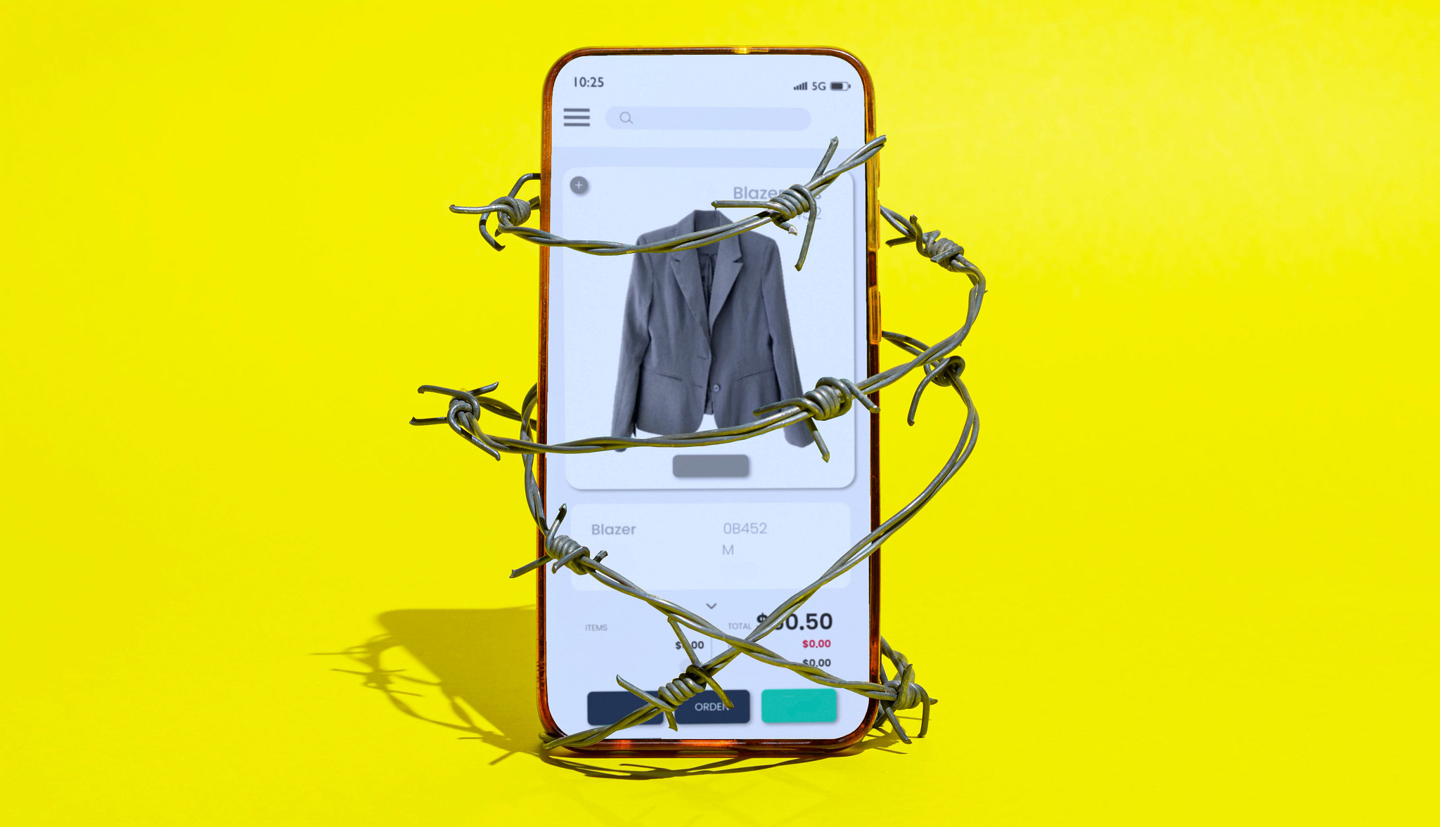 Smartphone in barbed wire on yellow background