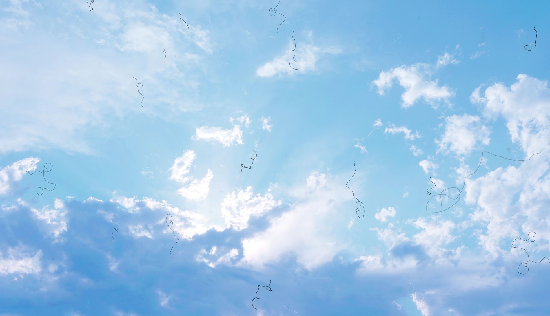 What to Know About Eye Floaters a person with eye floaters looks up at the sky
