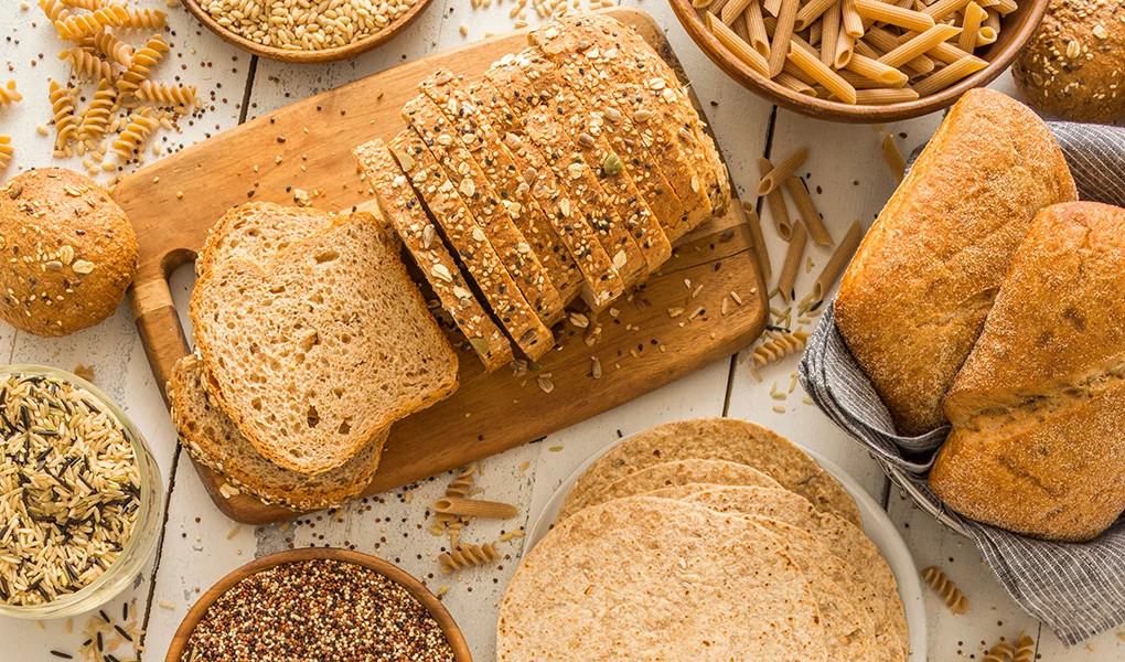A close-up view of a variety of whole grains on a table