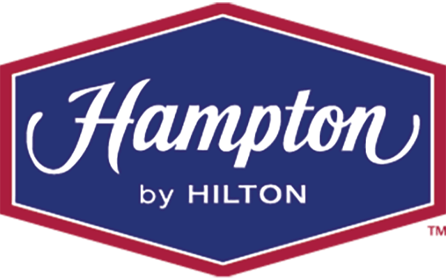 Hampton by Hilton logo with white lettering in a blue, red outlined square/triangle shape