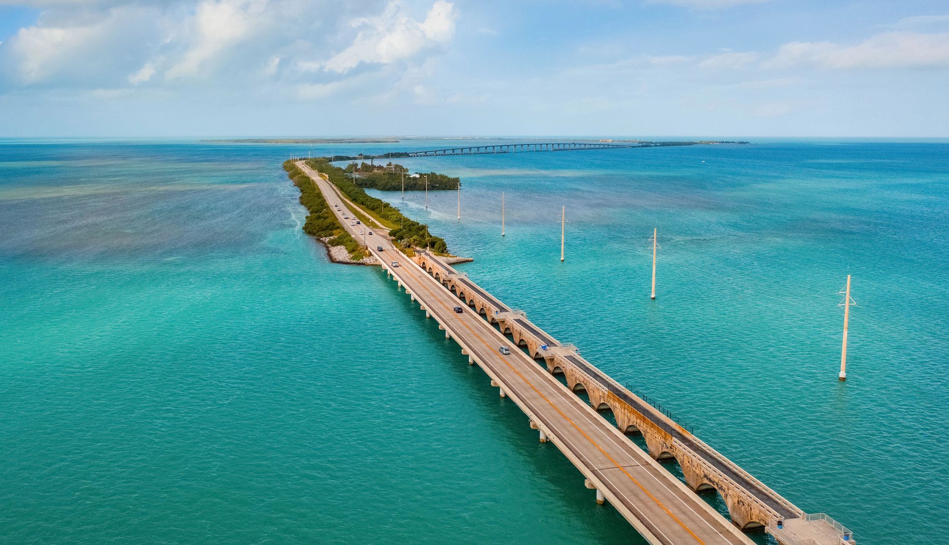 Affordable U.S. Destinations a stretch of road above water in florida
