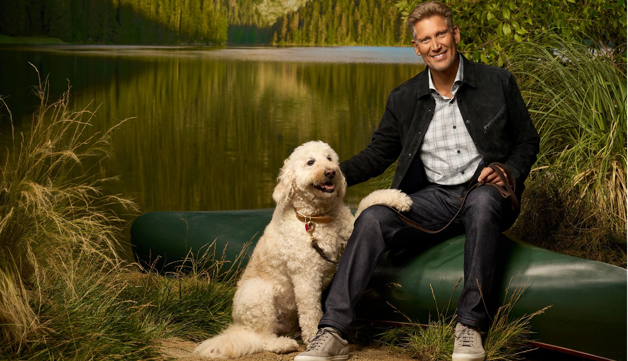 Gerry Turner is the first "Golden Bachelor" Gerry Turner sitting by body of water with dog