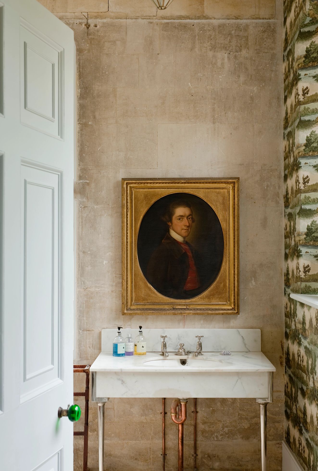 a digital print can change the look of a bathroom OIl painting above wash basin in a bathroom