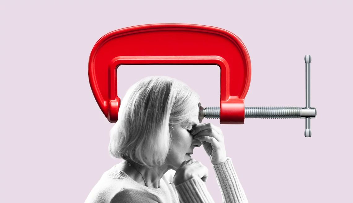 There is a common myth that high blood pressure causes headaches. a woman holding her head and appearing in pain, a vice grip appears around her head